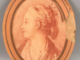 a red and white portrait of a woman in profile
