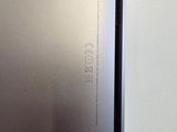 a close up of the back of an iphone with a silver screen