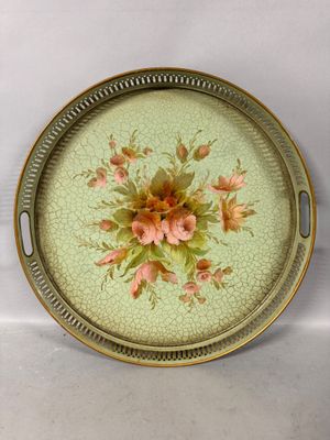 an image of a tray with flowers on it sitting on a table