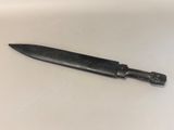 a knife that is laying on a table