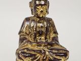une image représentant une statue de Bouddha assis en position du lotus