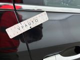 a sticker on the door of a car that says vauto