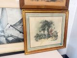 two framed pictures of a man on a boat and a man on a horse