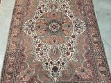 a large oriental rug on the floor in a room