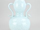 an image of a blue vase with two handles