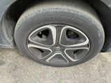 a close up of a tire on a car ' s rim
