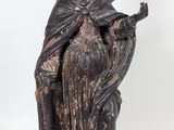 an image of a statue of a woman with a bird in her hand