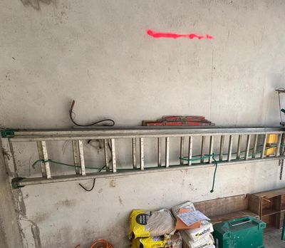 a garage with a shelf and a lot of items