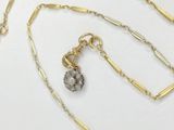 gold filled necklace with a crystal pendant and a gold chain