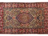 tapis persan antique à motif de médaillon sur fond rouge