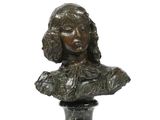 bronze bust of a woman on a pedestal on a white background