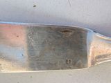 a knife that is sitting on a table
