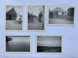 four black and white photographs of a beach with a few huts