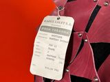 an image of a mannequin with a tag on it ' s neck