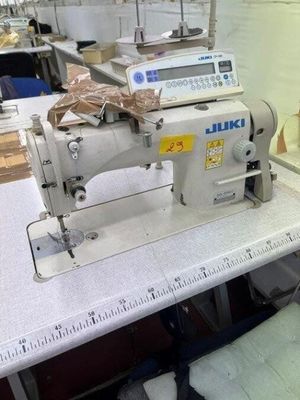 a sewing machine that is sitting on a table