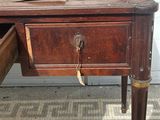 an old wooden desk with a drawer underneath it