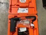 a tool in the case that is sitting on the floor