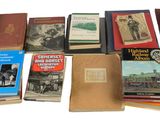 a lot of books that are sitting on a table