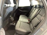 the back seats of a car are empty and the passenger seat is empty