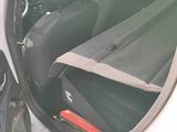 a car door with a mirror and a seat belt in it