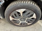 a close up of a tire on a car ' s rim