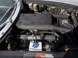 a car engine that is in the trunk of a car