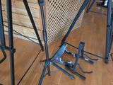 a hammock that is sitting on the floor next to a table