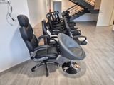 a lot of chairs that are lined up in a row