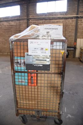 a cart with a lot of boxes on it in a warehouse
