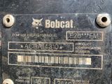 a close up of a metal plate with a barcode on it
