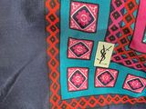 a blue bag with a pink and blue pattern on it