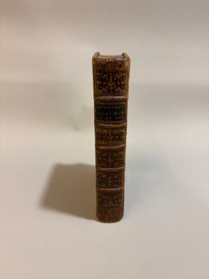 a small book that is sitting on a table