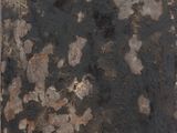 an image of a piece of rusted metal on a white surface