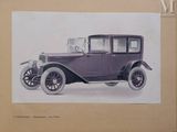 a picture of an old car on display in a book