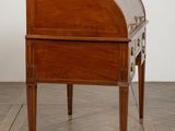 an image of a small wooden desk with a glass top