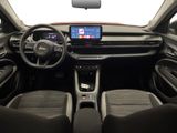 the interior of a car with a steering wheel, dashboard, and dashboard screen
