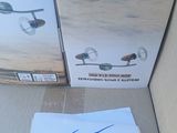 a cardboard box with a sign on it and a box with a remote control on it