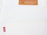 the back of a pair of white jeans with a label on it