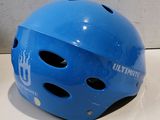 a blue helmet that is sitting on a table