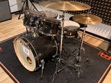 the drum kit is ready to be used in the recording room