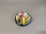 a picture of a rock with a colorful design on it