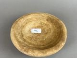 an image of a brown bowl with a label on it