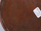 a sticker that is on the side of a bowl