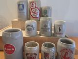 many different types of coffee mugs on the table