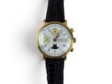 an image of a close up of a wrist watch on a white surface