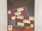a box that has a game of rummy on it