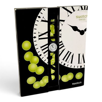 une boîte sur laquelle sont représentés une horloge et une grappe de raisin
