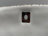 chanel, a white leather flap bag, ca 1950
