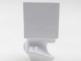a white object with a square on top of it