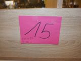 un post-it rose sur lequel est inscrit le chiffre quinze